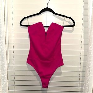 hot pink bodysuit